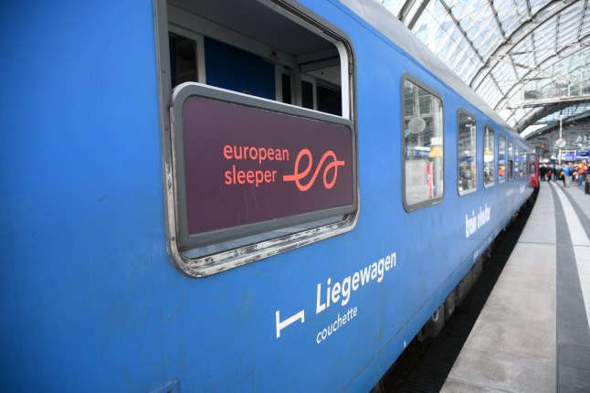 The first European Sleeper night train from Paris to Berlin is pictured after its arrival in Berlin, on March 27, 2026. The cooperative European Sleeper was founded to promote night train travel across Europe. (Photo by RALF HIRSCHBERGER / AFP via Getty Images)